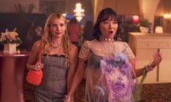 This image released by Amazon shows Emma Roberts, left, and Poppy Liu in a scene from "Space Cadet." (Prime Video via AP)