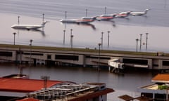 Planes are seen on the flooded tarmac of Don Mueang airport in Bangkok, the Thai capital, in November 2011