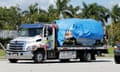 A white van seized during an investigation into a series of parcel bombs is towed into FBI headquarters in Miramar, Florida, U.S. October 26, 2018. REUTERS/Joe Skipper