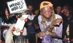 BESTPIX: Lil Wayne 36th Birthday Party/Carter V Release Party<br>(EDITORS NOTE: Retransmission with alternate crop.) LOS ANGELES, CA - SEPTEMBER 28: Lil Wayne stands next to his birthday cake at his 36th birthday party and Carter V release at HUBBLE on September 28, 2018 in Los Angeles, California. (Photo by Jerritt Clark/Getty Images for Young Money Records)