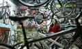 woman standing by bikes