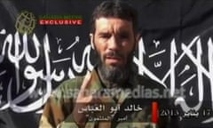 Veteran jihadist Mokhtar Belmokhtar speaks in this file still image taken from a video released by Sahara Media on January 21, 2013. Mauritanian media, including Sahara Media, are opening a window into the shadowy world of Islamist groups operating in the vast, lawless Sahara. While other journalists fled after the Islamists seized control of northern Mali, Sahara Media kept a correspondent in the ancient caravan town of Timbuktu, documenting how al Qaeda's north African wing AQIM imposed violent sharia law, including amputation of limbs, and destroyed sacred Sufi mausoleums. Sahara Media also covers regional news and affairs, especially from Algeria and Morocco, in French, and has chat forums and ads as well. To match Feature MALI-REBELS/MAURITANIA REUTERS/Sahara Media via Reuters TV/Files  (ALGERIA - Tags: MEDIA CIVIL UNREST CONFLICT)
:rel:d:bm:GF2E92D118J01