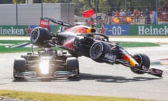 Formula One Grand Prix of Italy<br>epaselect epa09463572 Dutch Formula One driver Max Verstappen of Red Bull Racing collides with British Formula One driver Lewis Hamilton (L) of Mercedes-AMG Petronas during the start of the Formula One Grand Prix of Italy at the Autodromo Nazionale Monza race track in Monza, Italy, 12 September 2021. EPA/MATTEO BAZZI