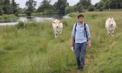 Writer Patrick Barkham walking next to the river Great Ouse at Ely.