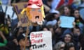 The head of a Donald Trump pinata is held at the end of a stick during a protest outside the Hyatt Regency Hotel where The US Republican presidential candidate was speaking in Burlingame, California on April 29, 2016.   / AFP PHOTO / Josh EdelsonJOSH EDELSON/AFP/Getty Images