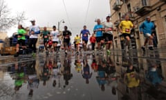 Marathon runners passing Jaffa Street in the annual Jerusalem Marathon.