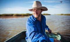 Jamie Woods, chair of the Nari Nari Tribal Council and land manager of Gayini, sailing a small boat.