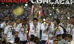Chivas players hold the trophy aloft as they celebrate winning the Concacaf title for the first time since 1962