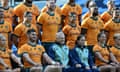 The Wallaroos and the Wallabies unite for a combined team photo before their Test wins in Sydney last week.