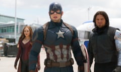 This image released by Disney shows Elizabeth Olsen, left, Chris Evans and Sebastian Stan in a scene from Marvel's "Captain America: Civil War," opening in theaters nationwide on May 6, 2016. (Disney/Marvel via AP)