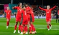 Portugal's Kika Nazareth is congratulated by teammates after scoring her side's second goal against Vietnam