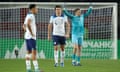 Harry Maguire looks dejected in front of England goalkeeper Jordan Pickford