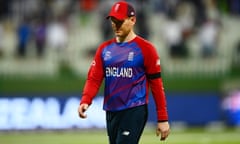 The England captain, Eoin Morgan, walks off the field after the semi-final loss to New Zealand in the T20 World Cup.