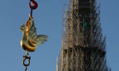 New golden rooster being installed atop the spire of Notre Dame cathedral as part of its reconstruction.