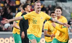 Jackson Irvine celebrates scoring his side's second goal against New Zealand at Gtech Community Stadium.