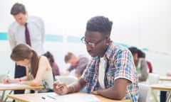 Students working at individual desks.