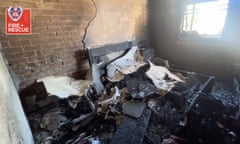 Burnt and blackened furniture and belongings inside an apartment