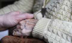 (FILES) This file photo taken on March 18, 2011 shows a woman, suffering from Alzheimer's desease, holding the hand of a relative in a retirement house in Angervilliers, eastern France. 
For decades now, soaring population growth and ageing rates have been forecast to ignite a global explosion of Alzheimer's, the memory- and freedom-robbing disease afflicting mainly 65-plussers. But an unexpected, and hopeful, trend may be emerging. / AFP PHOTO / Sébastien BOZONSEBASTIEN BOZON/AFP/Getty Images