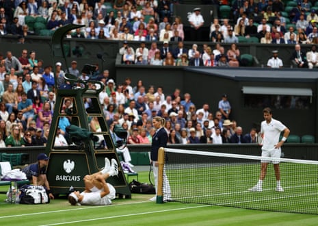 Germany's Alexander Zverev reacts after sustaining an injury.