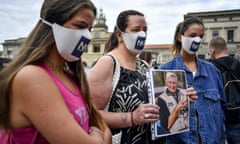 Members of Noi Denunceremo outside the court in Bergamo, Italy, in July.