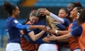 Joanna Grisez is mobbed by her teammates after scoring France’s second try in their 40-0 Six Nations win against Wales