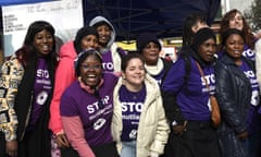 Women wearing purple anti-FMG slogan T-shirts pose for a group photo in Madrid, Spain, 6 Feb 2024