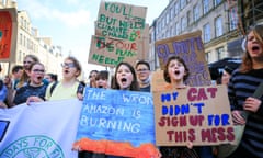 School students and activists take part in the Global Strike for Climate rally in Edinburgh.