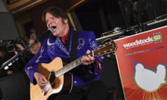 John Fogerty<br>FILE - In this March 19, 2019, file photo, musician John Fogerty performs at the Woodstock 50 lineup announcement at Electric Lady Studios in New York. Fogerty has pulled out of Woodstock 50 weeks before the trouble anniversary event is supposed to take place. A representative for the singer tells The Associated Press that Fogerty, who performed at the original festival in 1969, will now only perform at a smaller Woodstock anniversary event held at the original site in Bethel, New York. (Photo by Evan Agostini/Invision/AP, File)