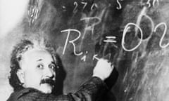 Einstein Writing Equation on Blackboard<br>Theoretical physicist Albert Einstein writes a complicated equation on a blackboard. He is at the California Institute of Technology for a lecture being given by Swedish astronomer Dr. Gustave Stromberg.