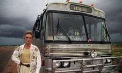 Terence Stamp as Bernadette Bassenger beside Priscilla the bus in the 1994 Australian film The Adventures of Priscilla, Queen of the Desert