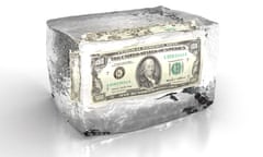 100 dollar bill frozen in ice cube