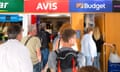 Crowds in a queue for airport car hire desk, Lanzarote