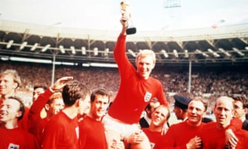 World Cup Final, 1966, Wembley, England. England captain Bobby Moore holds aloft the World Cup trophy as he sits on the shoulders of his teammates, from left to right: Jack Charlton, Nobby Stiles, Gordon Banks (behind), Alan Ball, Martin Peters, Geoff Hurst, Bobby Moore, Ray Wilson, George Cohen and Bobby Charlton