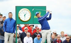 Martin Kaymer (left) watches Paul Casey.