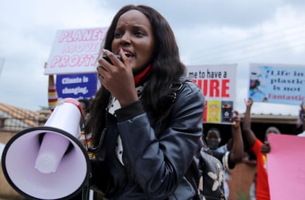 Nakate and fellow activists campaign in a suburb of Kampala in September 2020