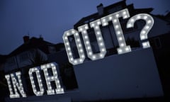 In or Out sign is pictured outside a house in Hangleton near Brighton in southern England, on June 23, 2016, as Britain holds a referendum on whether to stay or leave the European Union.