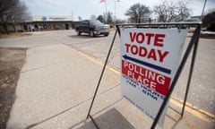 A truck leaves a polling place in Warren, Michigan