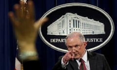 Jeff Sessions at a news conference in March 2017. The three reporters were looking at documents that suggested Sessions, before he became attorney general, had spoken to Russian envoy Sergey Kislyak.