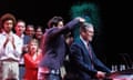 Labour leader Keir Starmer reacts after a protester threw glitter on him at the start of his keynote address to delegates on the third day of the annual Labour party conference in Liverpool.