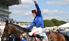 Adam Kirby celebrates on top of Adayar after winning the Derby.