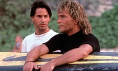 Keanu Reeves (left) as FBI rookie Johnny Utah and Patrick Swayze as surfer/bank robber Bodhi in the 1991 action film Point Break.
