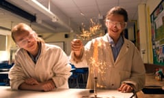 Secondary school pupils undertaking a science experiment in the laboratory