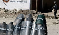 Police with riot shields in Espinar, Peru, during a villagers' protest against Xstrata in 2012