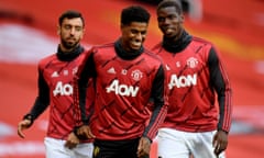 Manchester United’s Marcus Rashford (centre), Paul Pogba (right) and Bruno Fernandes warming up at Old Trafford