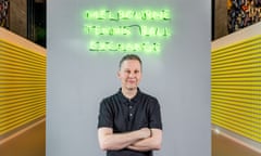 Portrait of artist David Shrigley with his work Melbourne Tennis Ball Exchange 2023 on display as part of Triennial EXTRA from 19-28 January 2024, a celebration of the NGV Triennial exhibition at NGV International, Melbourne.