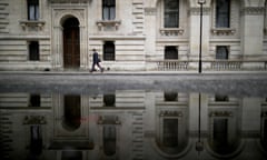 Man walks past government buildings in Whitehall as David Cameron holds his first cabinet meeting since Brexit on June 27, 2016 in London, England.