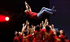 Spain's players toss head coach Luis de la Fuente in the air as they celebrate their Uefa Nations League triumph at a celebratory fan event in Madrid.