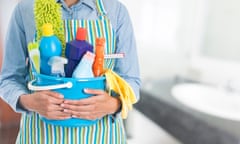 A woman with cleaning equipment.