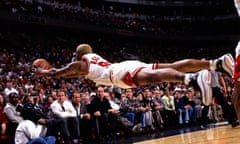 Rodman dives for loose ball<br>CHICAGO - 1997: Dennis Rodman #90 of the Chicago Bulls goes fully horizontal as he dives for a loose ball in 1997 during game at the United Center in Chicago, ILinois. NOTE TO USER: User expressly acknowledges and agrees that, by downloading and or using this photograph, User is consenting to the terms and conditions of the Getty Images License Agreement. (Photo by Sam Forencich/ NBAE/ Getty Images)