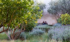 People in the Secret Garden Marrakech, aka Le Jardin Secret, garden museum, Marrakesh medina, Marrakech Morocco North Africa<br>R7NN1X People in the Secret Garden Marrakech, aka Le Jardin Secret, garden museum, Marrakesh medina, Marrakech Morocco North Africa